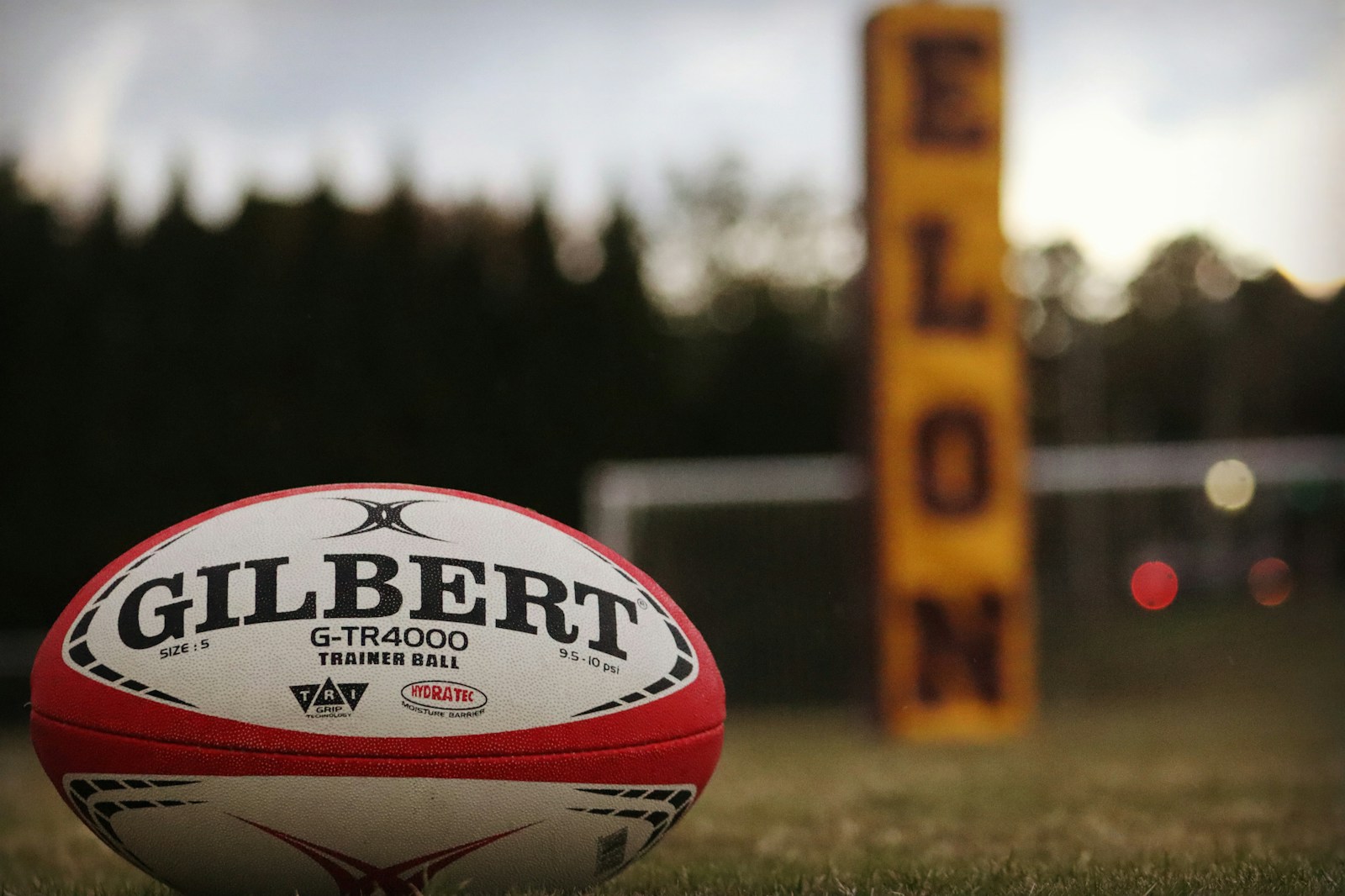 a close up of a rugby ball on a field